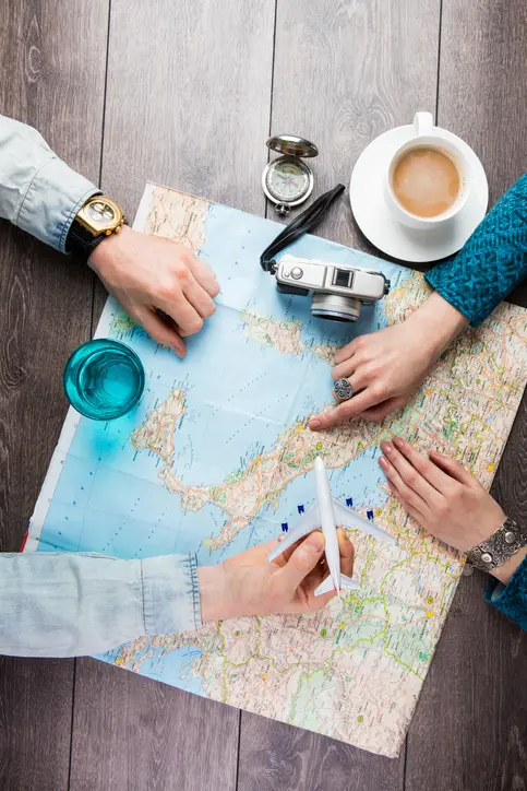 planning vacation trip with map. Top view. . romantic getaway. Vertical